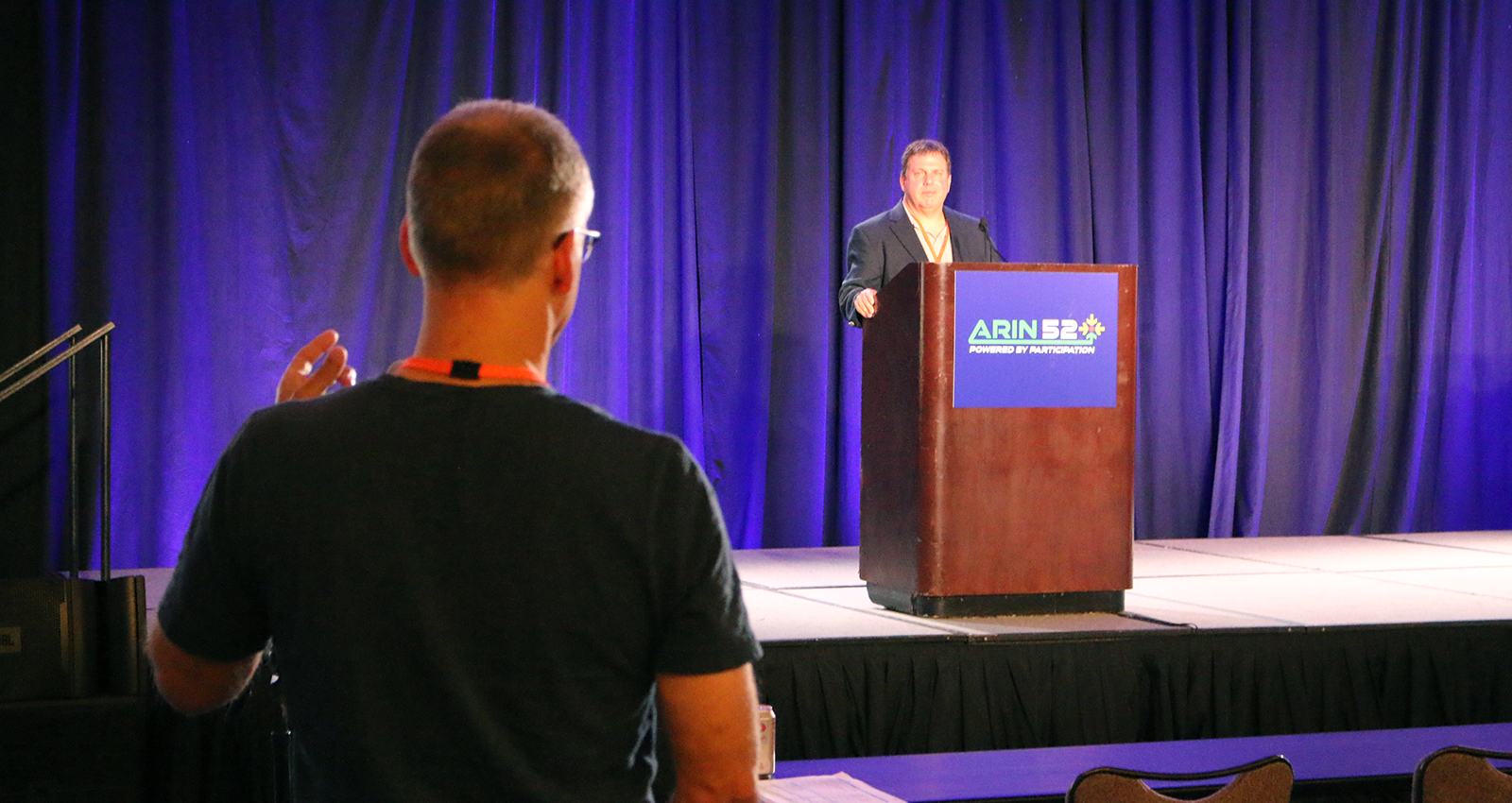 An ARIN 52 attendee asks a question after CTO Mark Kosters presented the Engineering Report